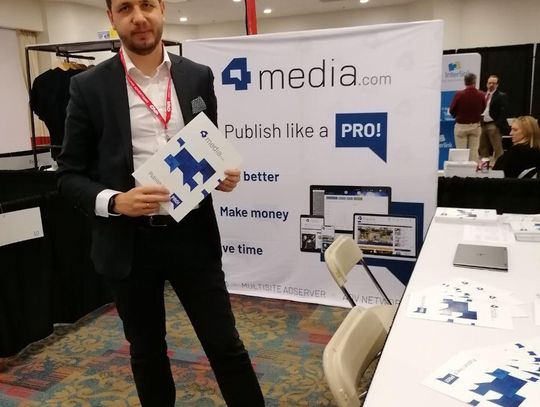 Piotr Marek from 4media at local media press tradeshow Des Moines Iowa